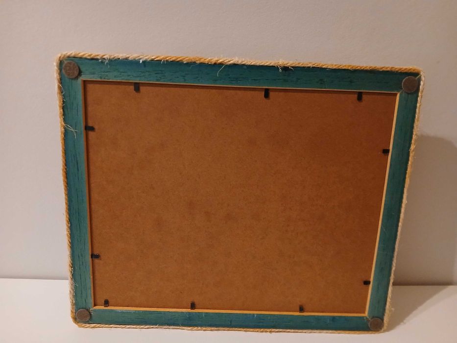 Moldura decorada com ráfia e conchas64552536568706124