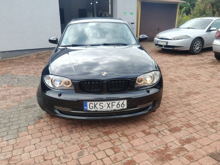 BMW e87 caly kpl przód lampy zderzak człowka ksenon