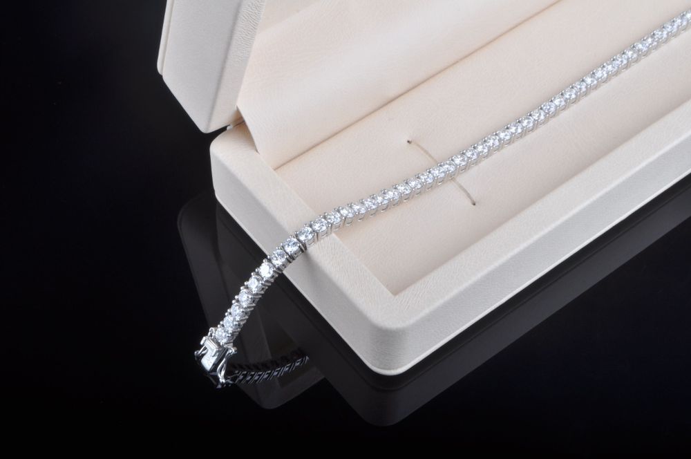 Тенисный браслет из белого золота с бриллиантами - 5.5ct