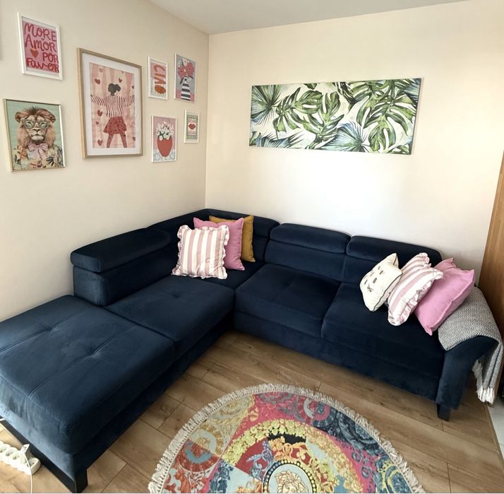 Narożnik granatowy lewostronny sofa regulowane zagtówki funkcja spania