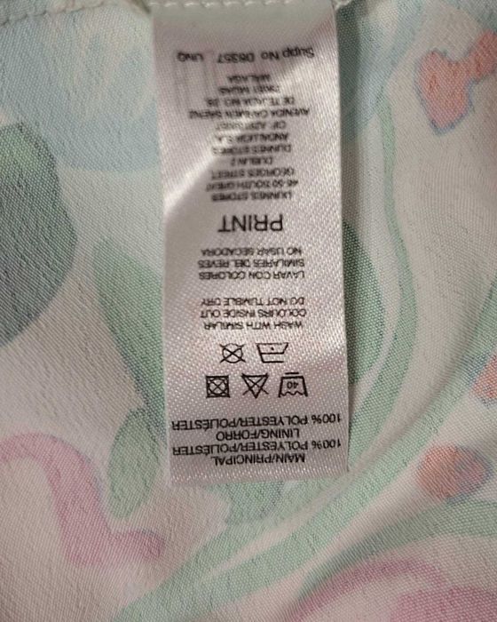 Zwiewna zielona kwiecista sukienka kaskadowa SAVIDA