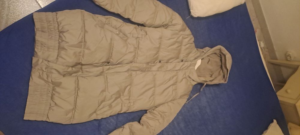 Casaco de penas comprido