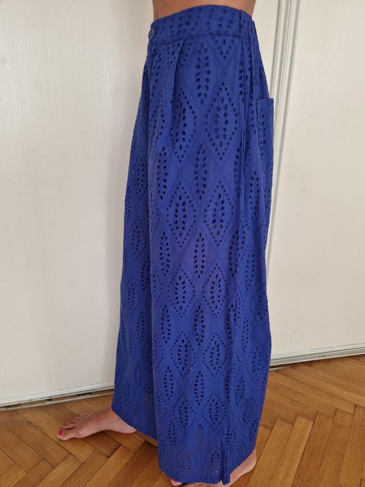 Piękne ażurowe bawełniane (100%) spodnie Reserved z podszewką szortami