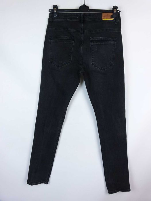 ZARA spodnie jeans z dziurami - 42 mex.32