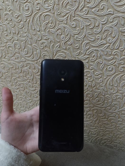 Телефон meizu, чорного кольору