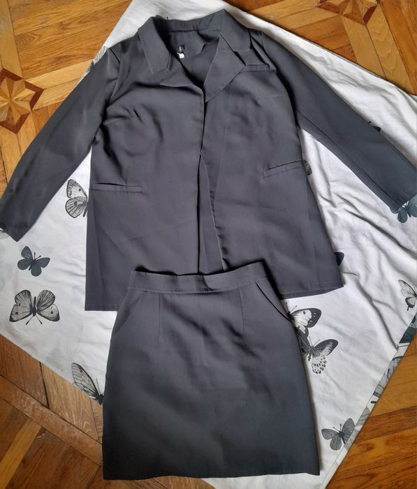 Сукні, костюми, платтячка жіночі