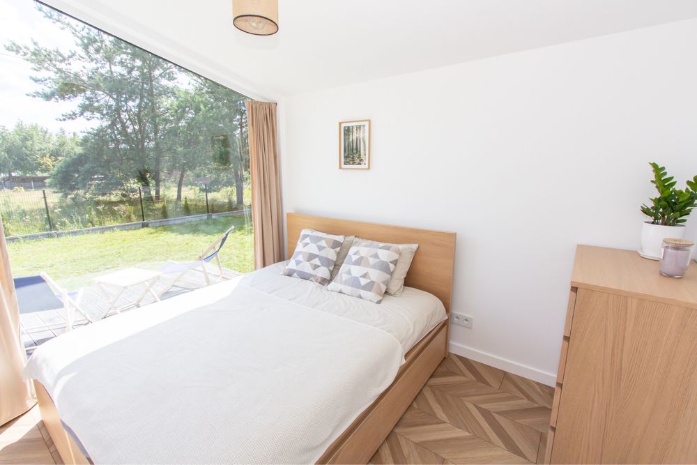 Domek letniskowy z widokiem na jezioro Spore