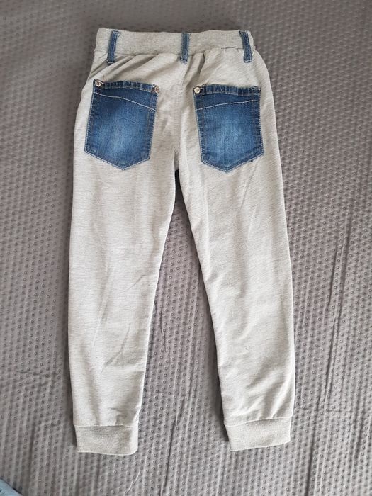 Dwie pary spodni 116 chłopięce jeansy dresowe joggery