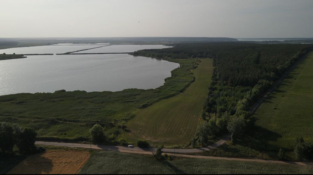 Продам участок 2.3 га на берегу водоема
