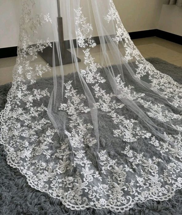 Véu de renda nunca usado