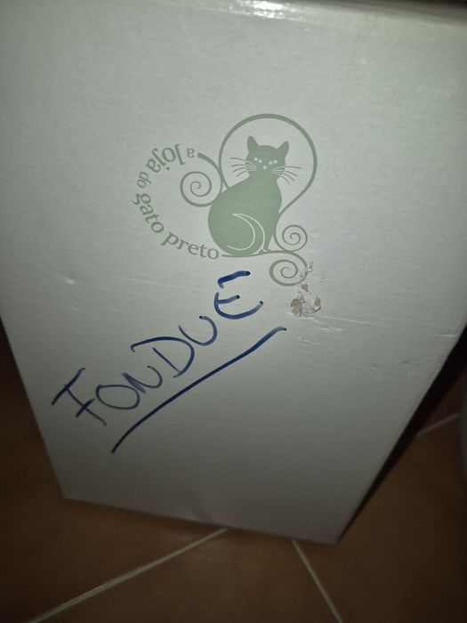 Fondue do gato preto