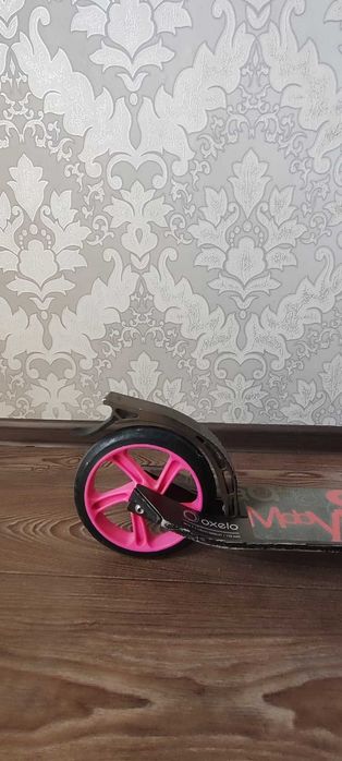 Самокат Oxelo Mid 7 — компактний та практичний, складається. Вага до 100кг