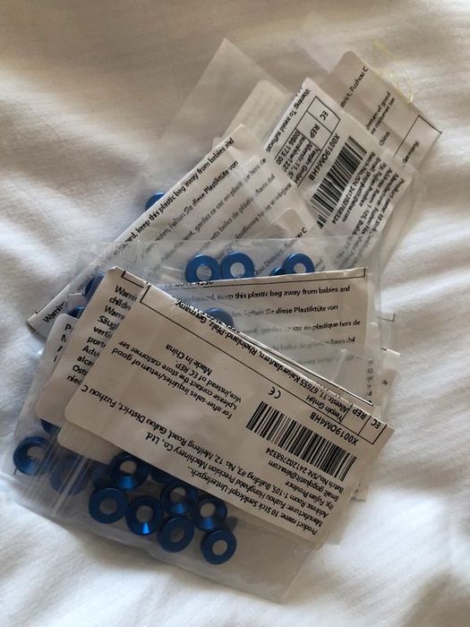 14 saquetas com 10 peças de anilhas