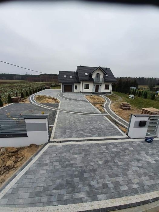 Uslugi Brukarskie, Układanie kostki brukowej