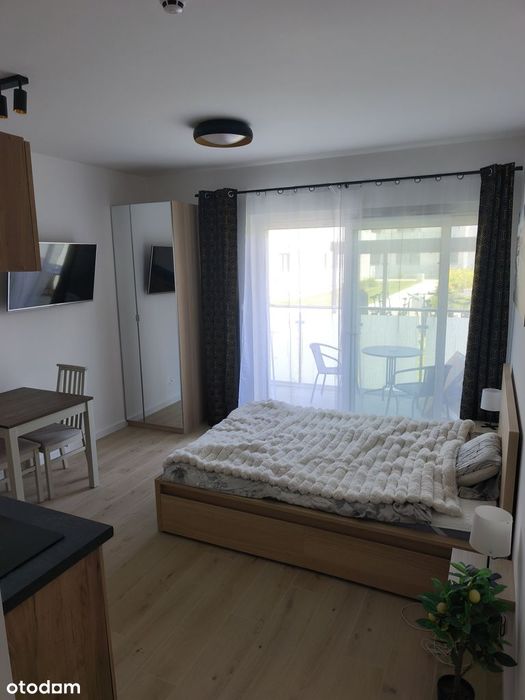 Lokal uzytkowy z tarasem i miejscem parkingowym Sunset Resort.