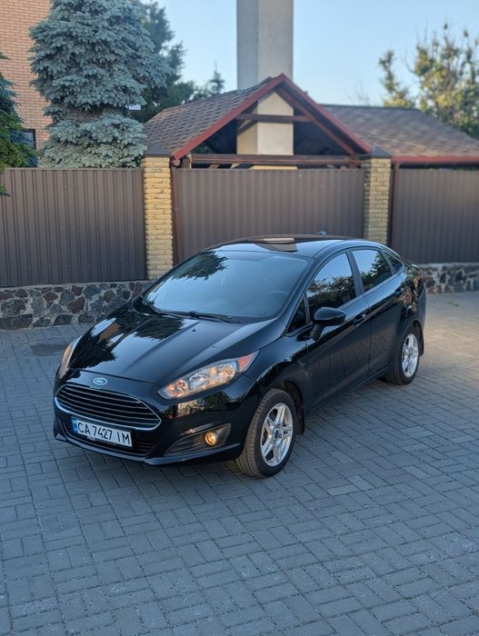 Ford Fiesta 2018 VIN 3FADP4BJ0JM108228 фото оголошення 2 з 20