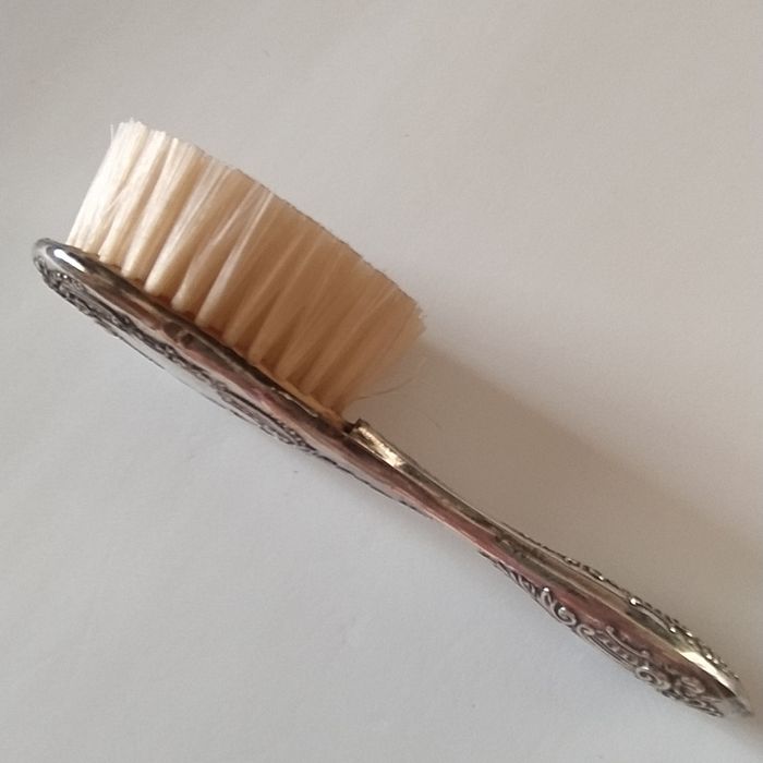Antiga escova de cabelo em prata