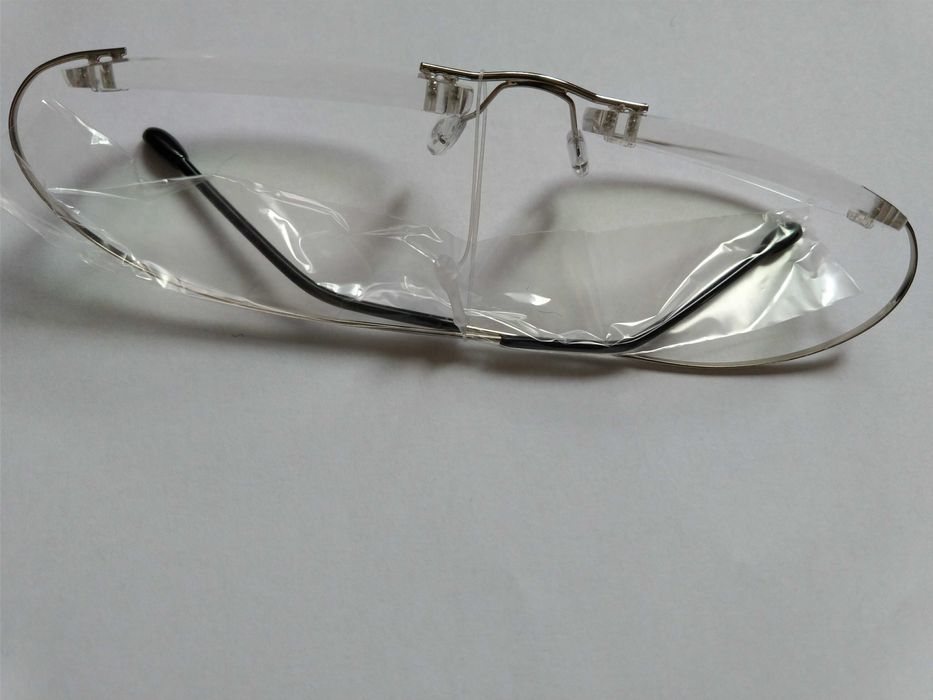 Титановые оправы, очки, футляры для очков