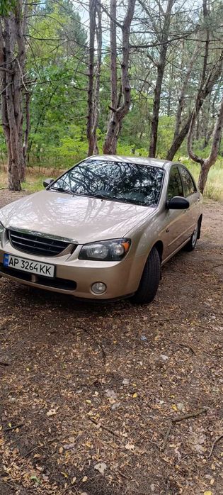 Kia cerato 2006 год