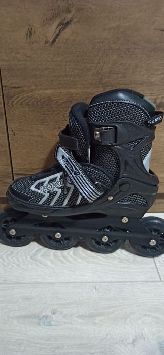 Роликовые коньки