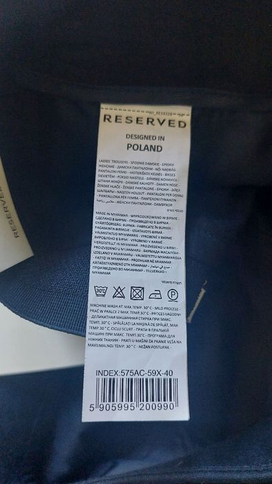 Nowe klasyczne spodnie Reserved granatowe z metką r.40