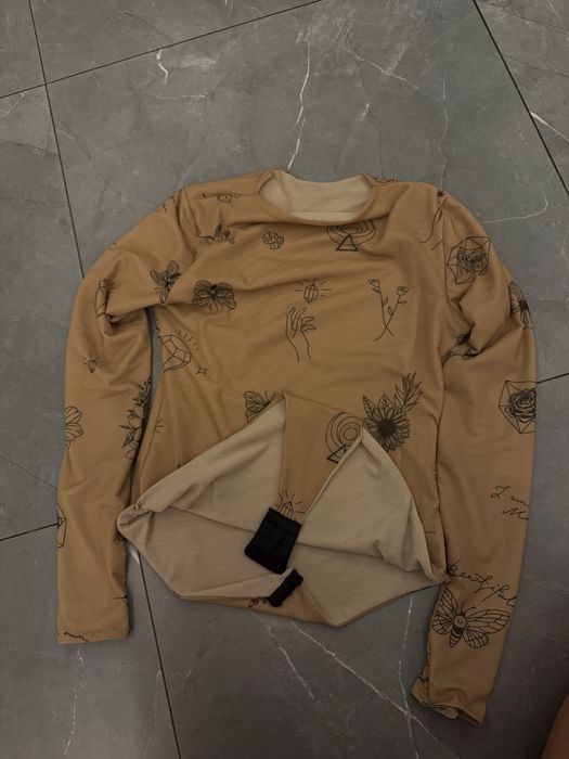 боді з татуюваннями