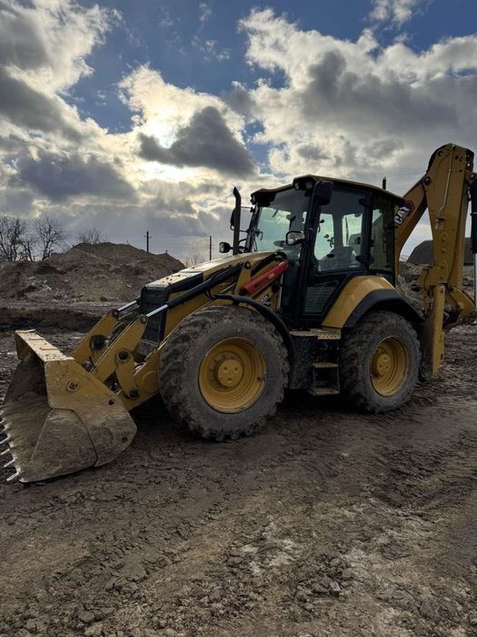 Екскаватор навантажувач  CAT-434