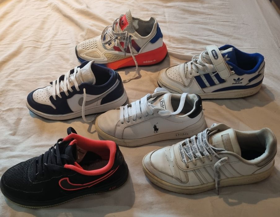 Tenis de marca em bom estado