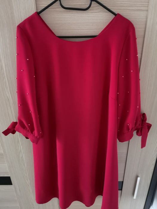 Sukienka damska r. 40/L trapez, lejący materiał