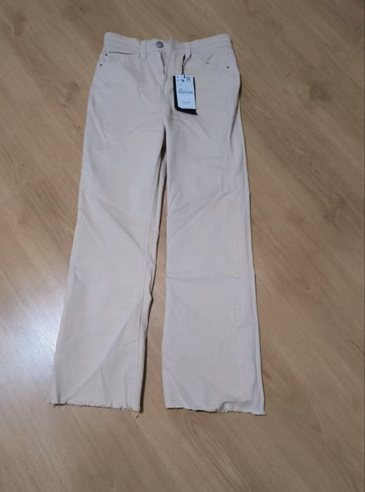 Calças Cropped Flare