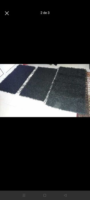 Dois conjuntos de tapetes