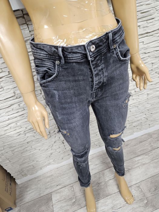 Super modne spodnie jeansowe damskie czarne Zara rozmiar 42 z przetarc
