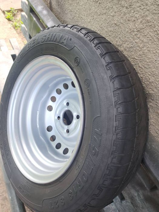 Продам фирменное колесо R13 4x100 Daewoo с шиной 175.70.