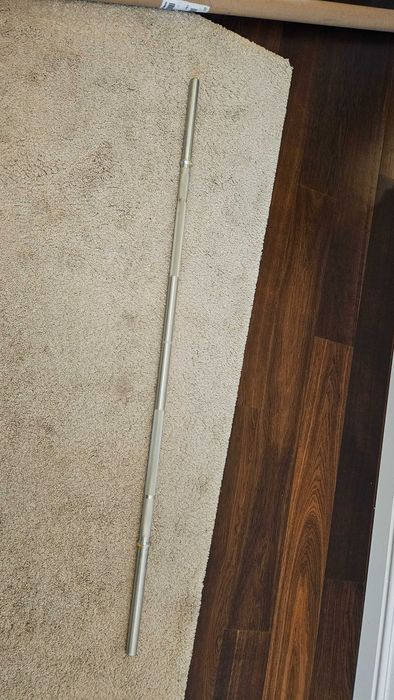 Gryf do treningu siłowego.