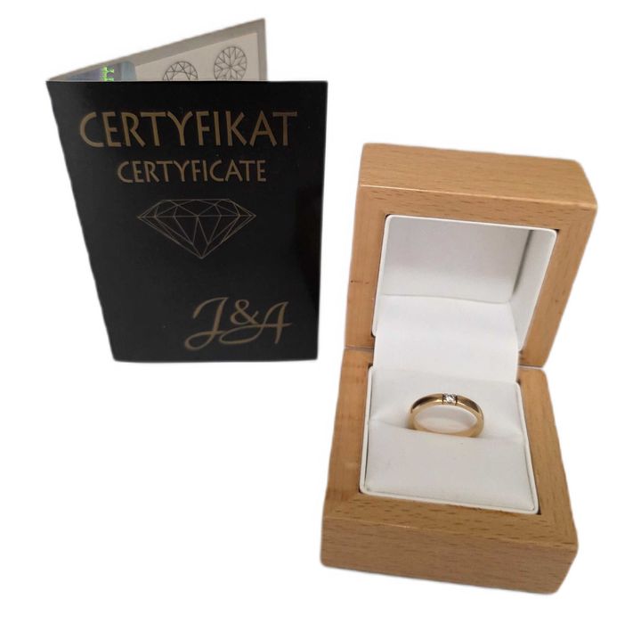 Złoty pierścionek z brylantem p585/3,27g/r11