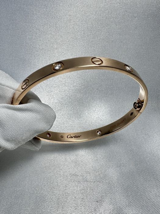 Золотий браслет у стилі Cartier з цирконієм
