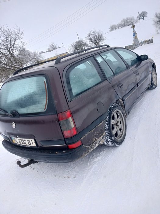 Опель Омега б 2.0 газ/бензин