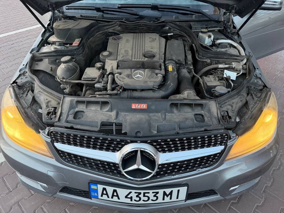 Mercedes-Benz C-Class 2014 VIN WDDGJ4HB2FG371207 фото оголошення 3 з 15