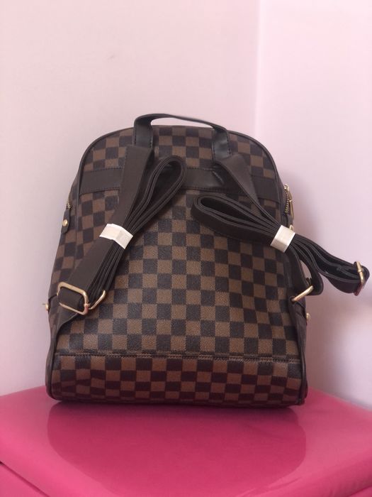 Mochila unisexo nova