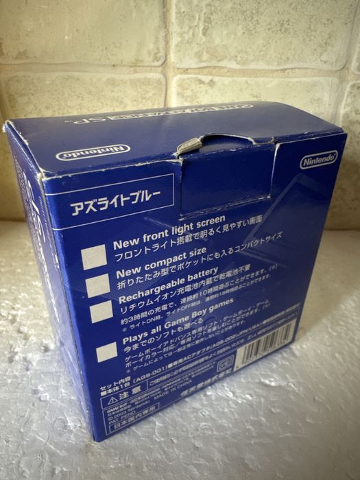 Konsola Nintendo Game Boy Advance SP - niebieska, w pudełku z ładowarką, grą i instrukcją
