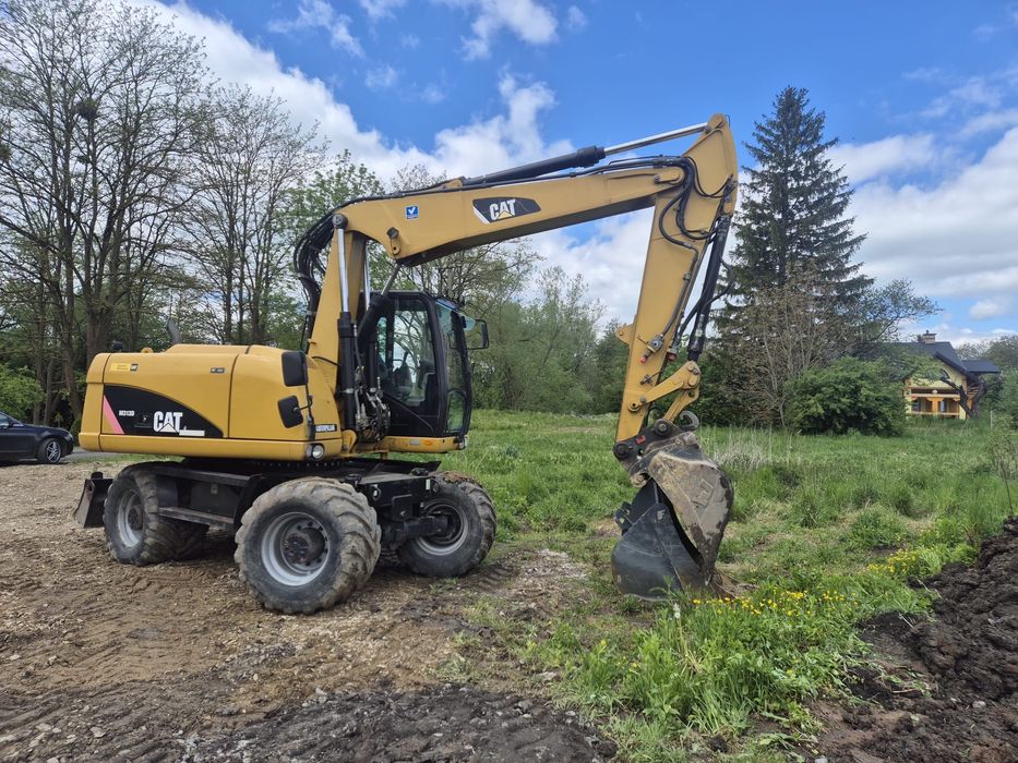 Koparka Cat Caterpillar M313D