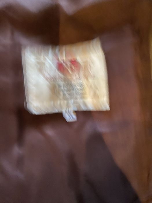 Colete em pele e malha