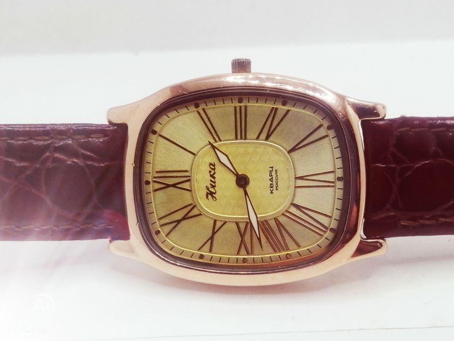 Золотые часы Ника