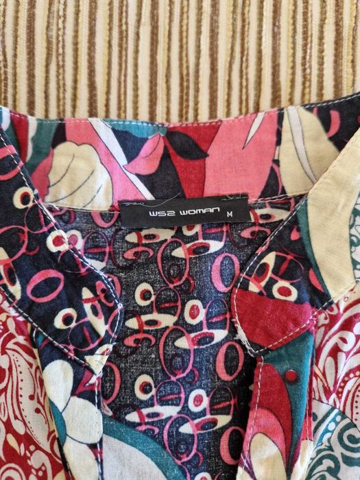 Túnica de manga curta