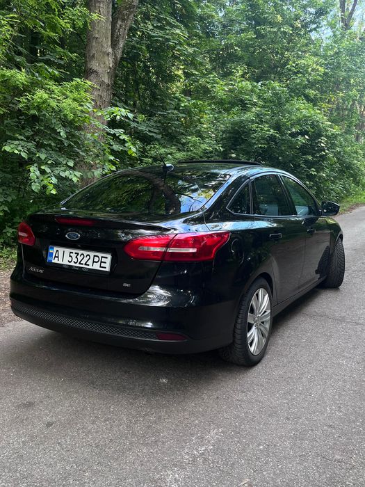 Ford Focus 2014 VIN 1FADP3F27FL203004 фото оголошення 7 з 12