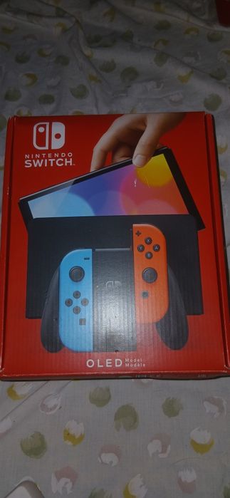 Nintendo Switch OLED (Como Nova) + Garantia + EA Sports FC 25 + Extras