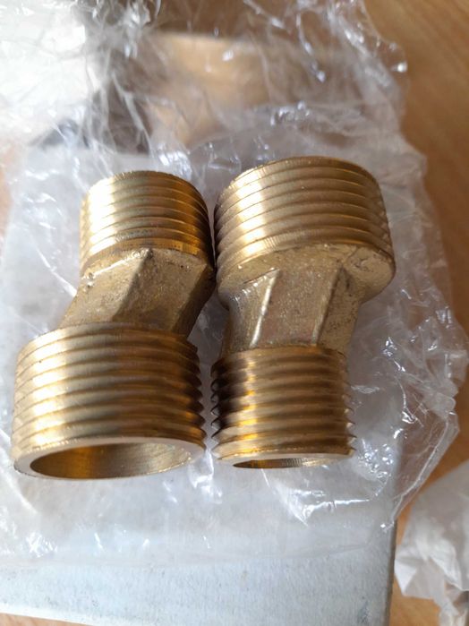 Zestaw: zawory, uszczelki, nakladki do baterii.