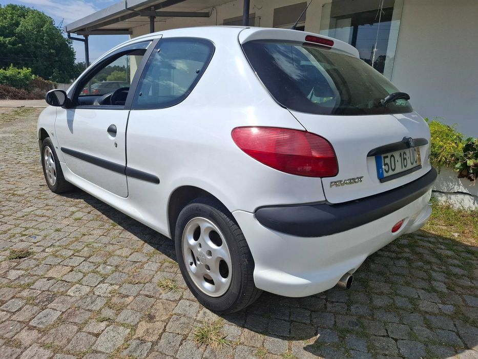 Peugeot 206 Gasolina Com A/C Estofos em Pele