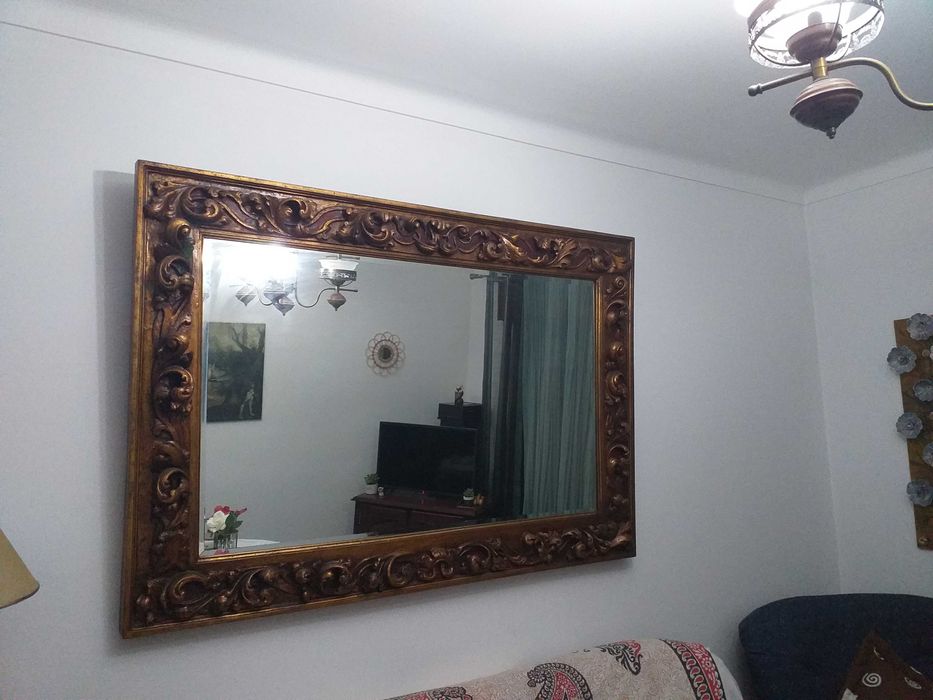 Espelho antigo em talha dourada