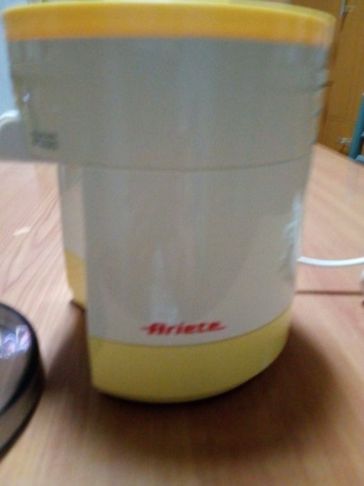 Expremedor de citrinos eletrico